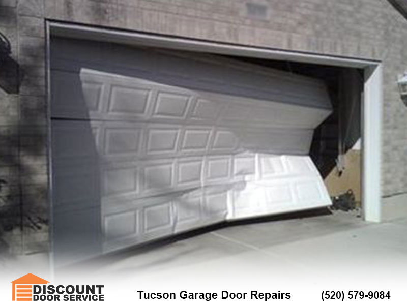 Garage Door Binds Bows In The Middle When Closing